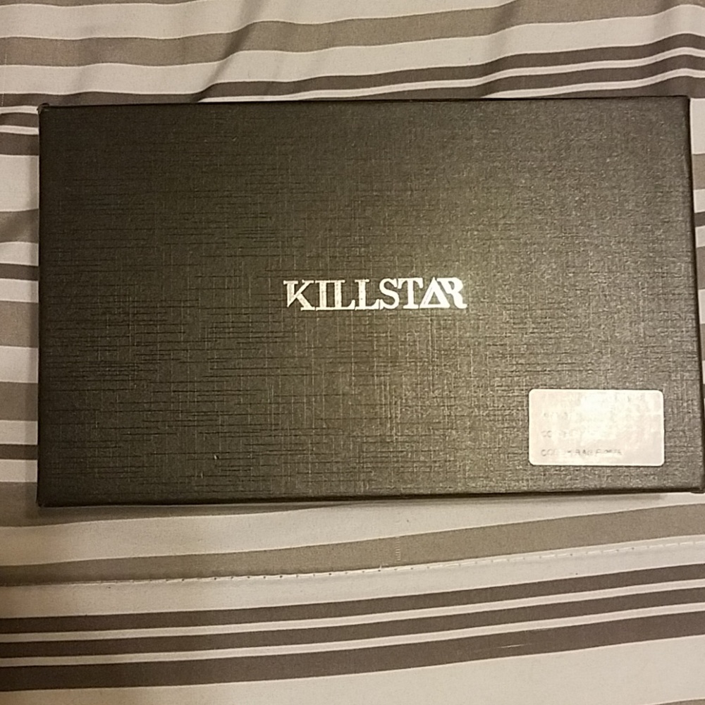 Killstar bat wing clutch